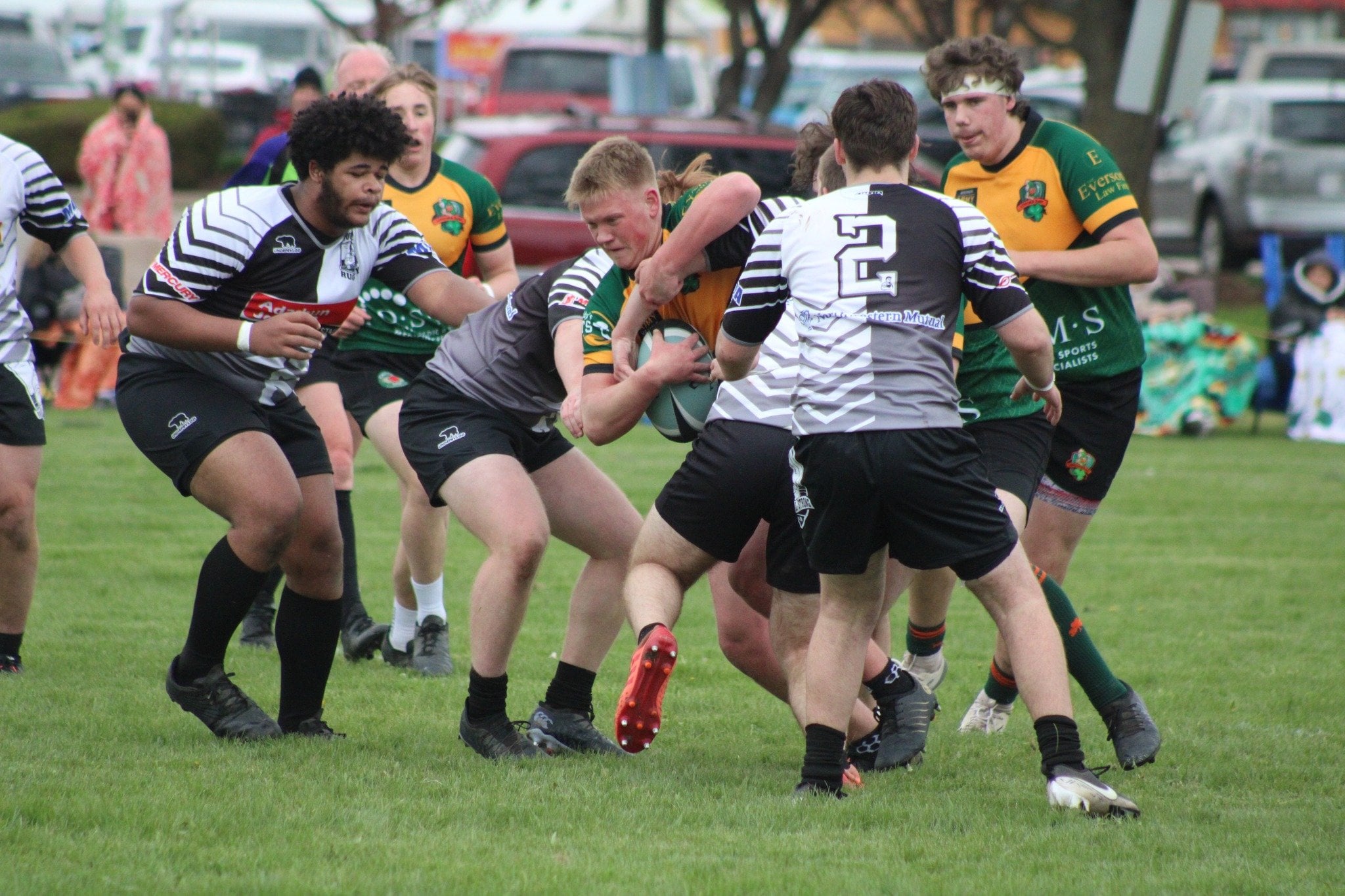 Youth rugby players on the field in NE Wisconsin